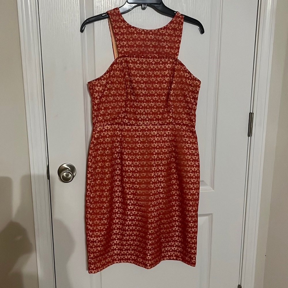 Size 8 Gabby Skye rust colored lace dress.